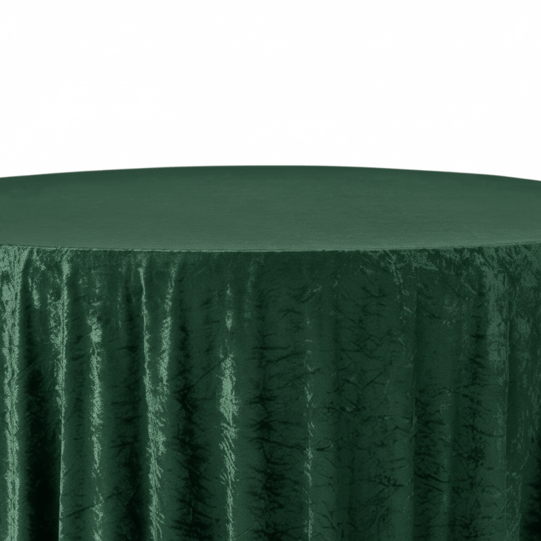 Dark green tablecloth on a round table with a white background