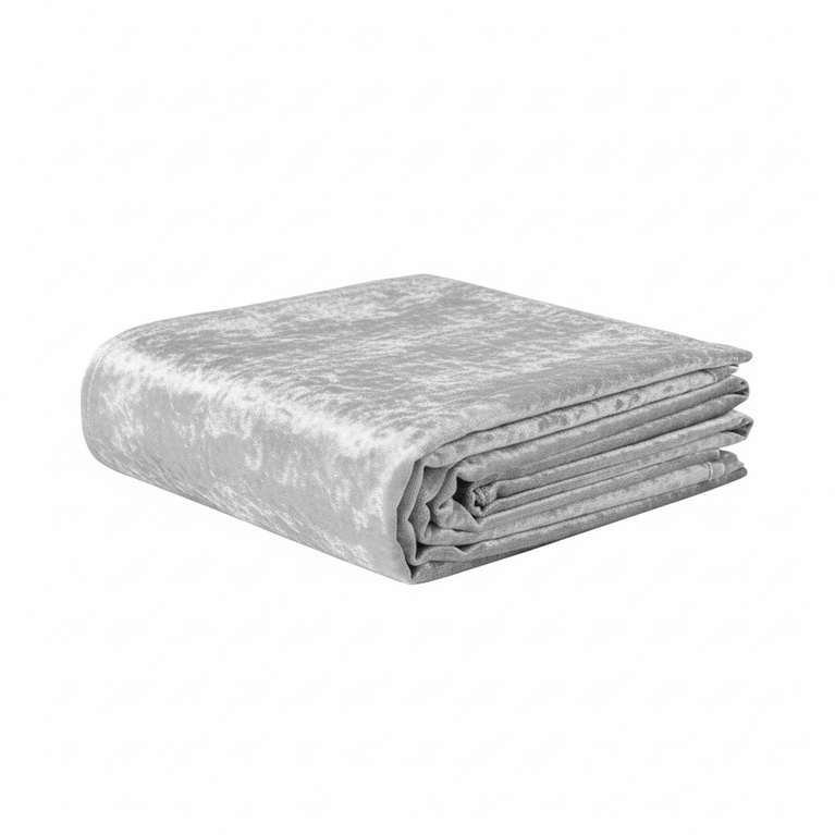 Folded silver velvet tablecloth on a white background