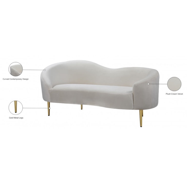Beige sofa with gold legs on a white background