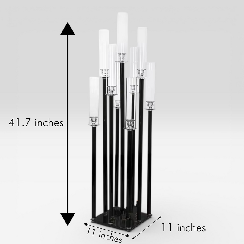 Black candle holder with clear candle cylinders and measurements on a gray background
