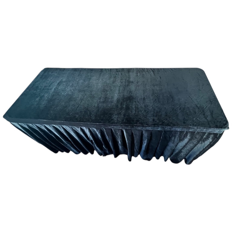 Rectangular black velvet tablecloth draping a table on a white background