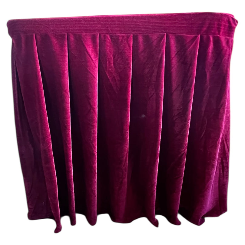 Maroon tablecloth on a white background