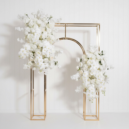Gold wedding arch with white flowers on a white background
