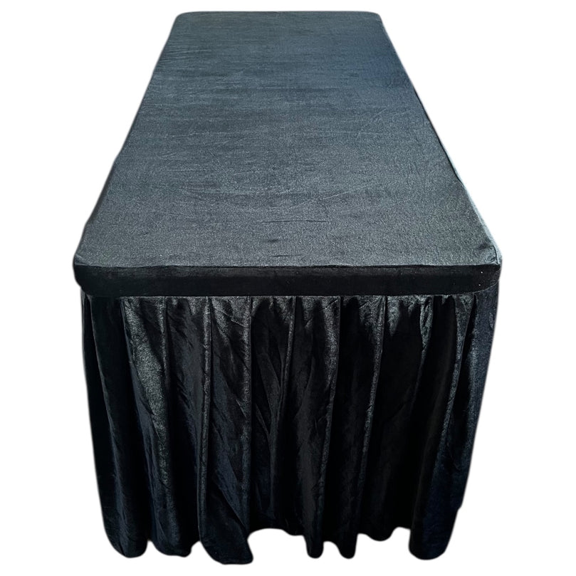 Rectangular table with a black tablecloth on a white background