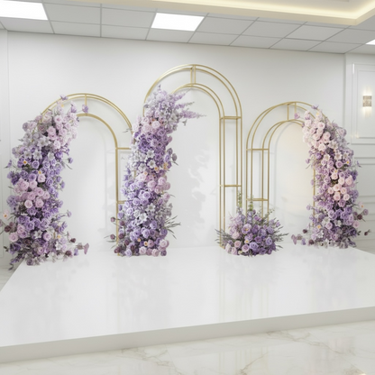 Decorative floral arches on a white wall with gold frames