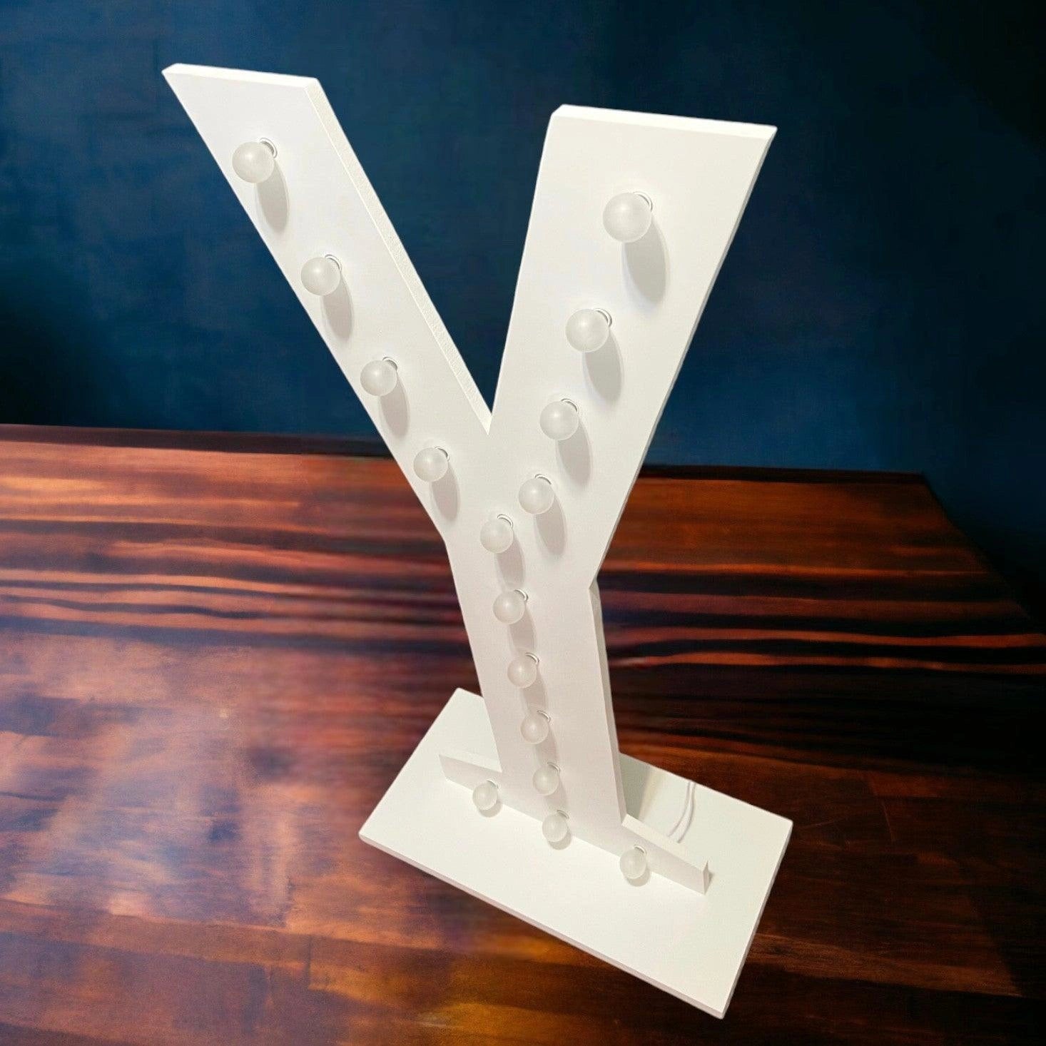 marquee light up letter Y with its lights off side view