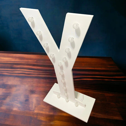 marquee light up letter Y with its lights off side view