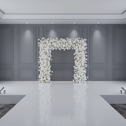 Decorative floral arch in a modern interior setting with gray walls and white floor.