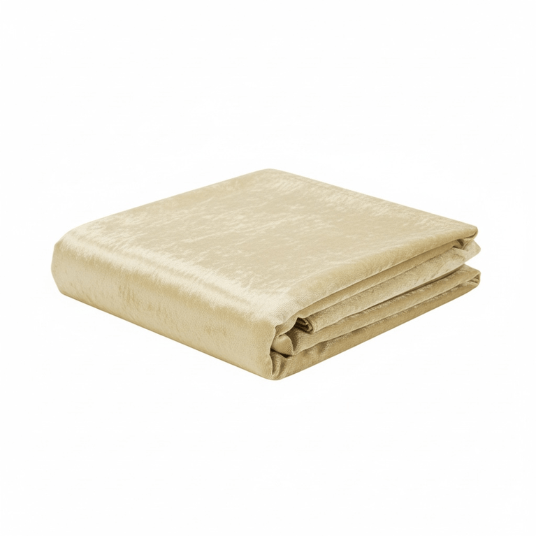 Champagne velvet tablecloth folded on a white background