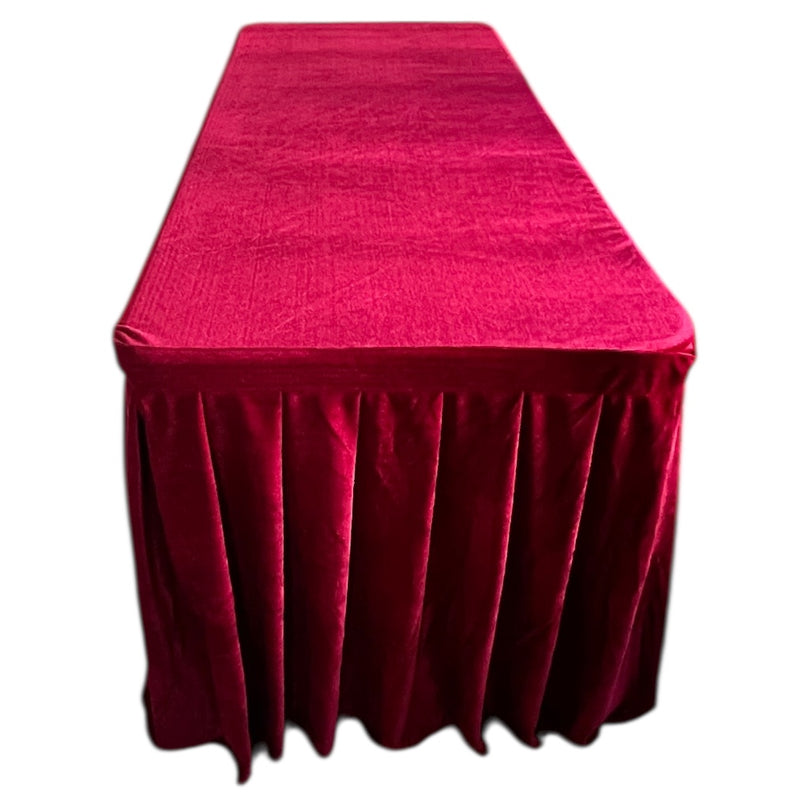 Burgundy velvet tablecloth on a white background