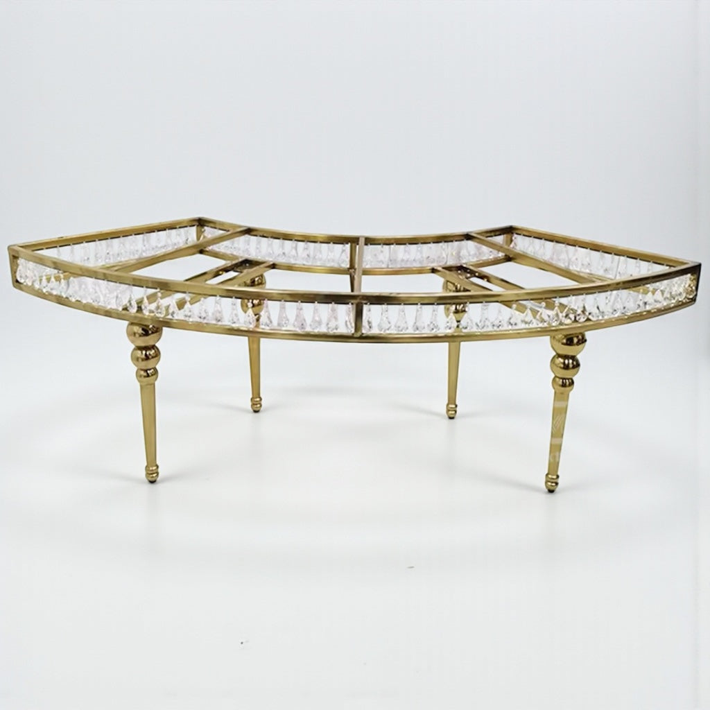 Decorative table with gold frame and crystal accents on a white background