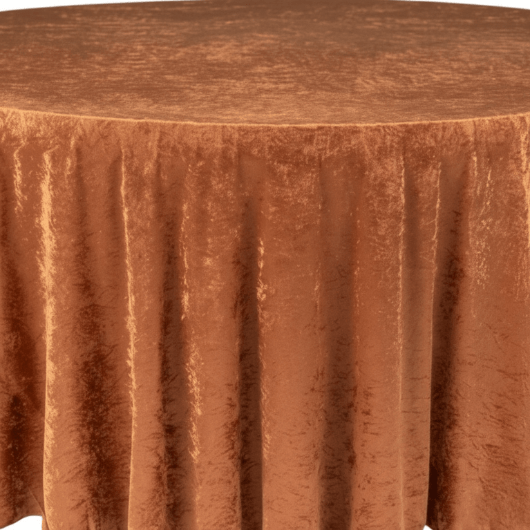 Round table with a terracotta pleated velvet tablecloth