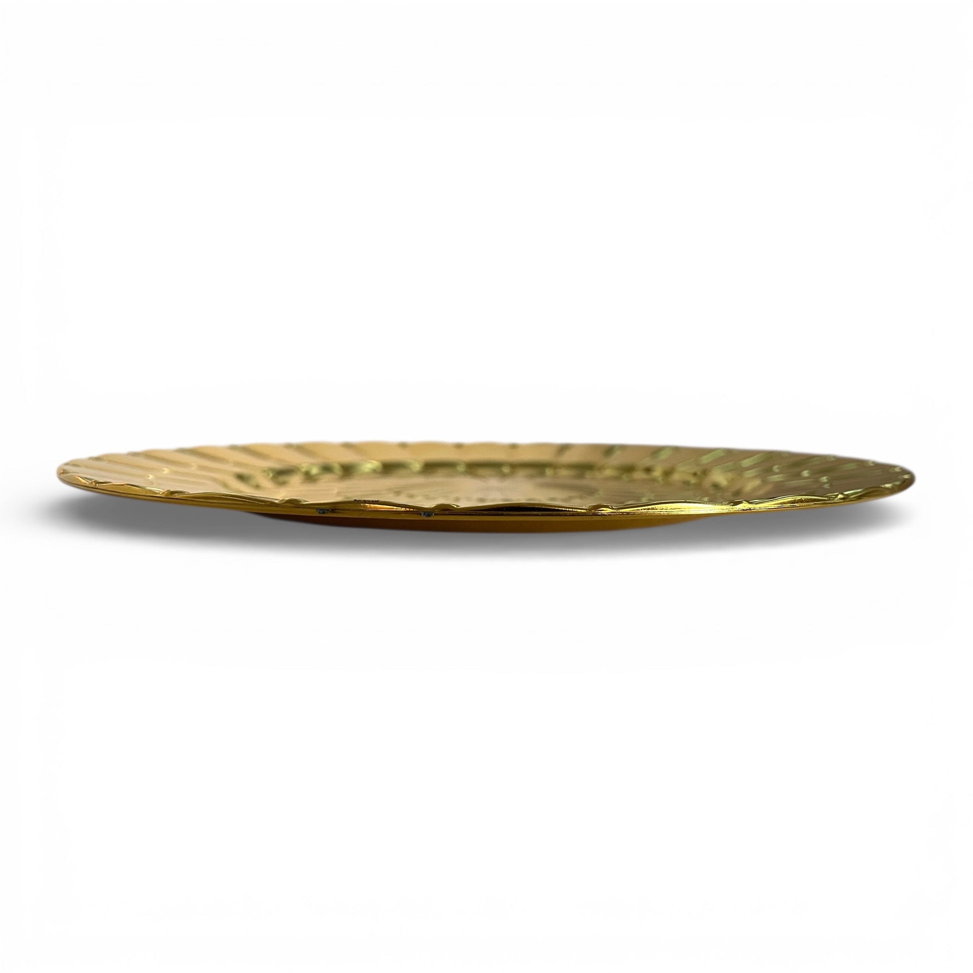 Gold decorative plate on a white background
