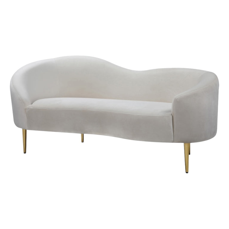 Modern curved beige sofa with gold legs on a white background