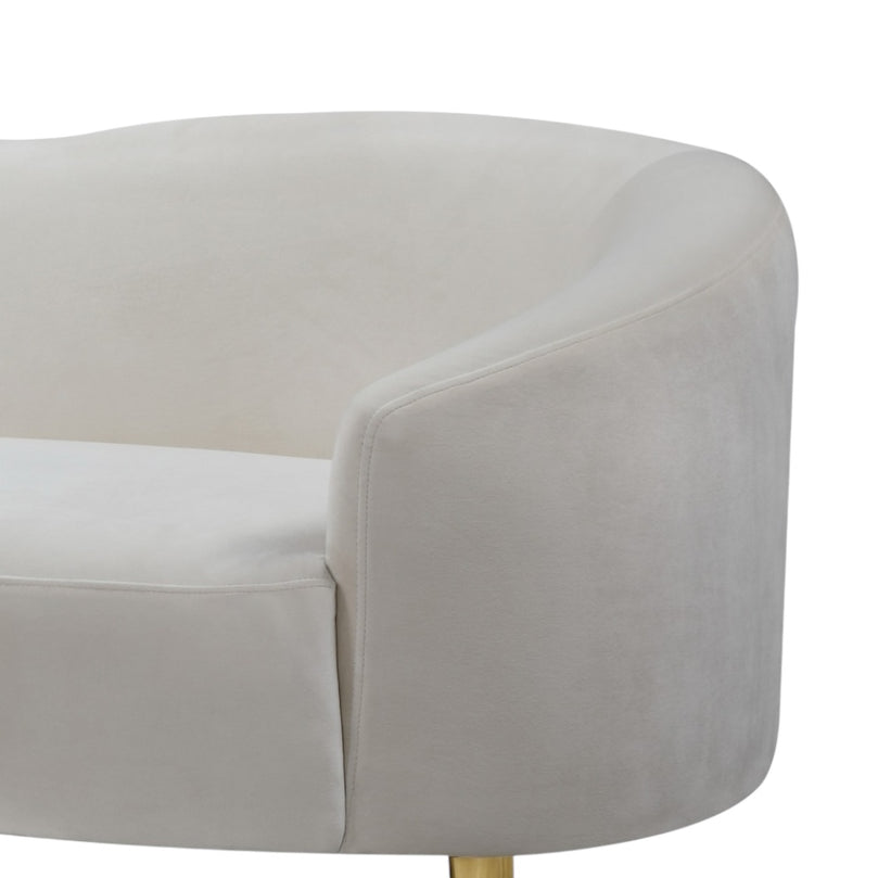 Beige upholstered chair with white cushion on a white background