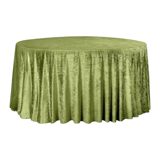 Green round velvet tablecloth on a white background