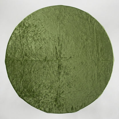 Sage green velvet tablecloth on a white background