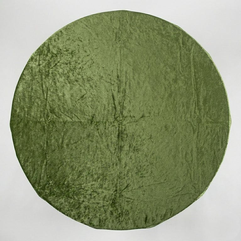 Sage green velvet tablecloth on a white background