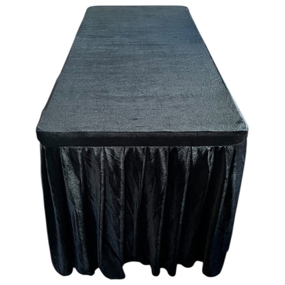 Rectangular table with a black tablecloth on a white background