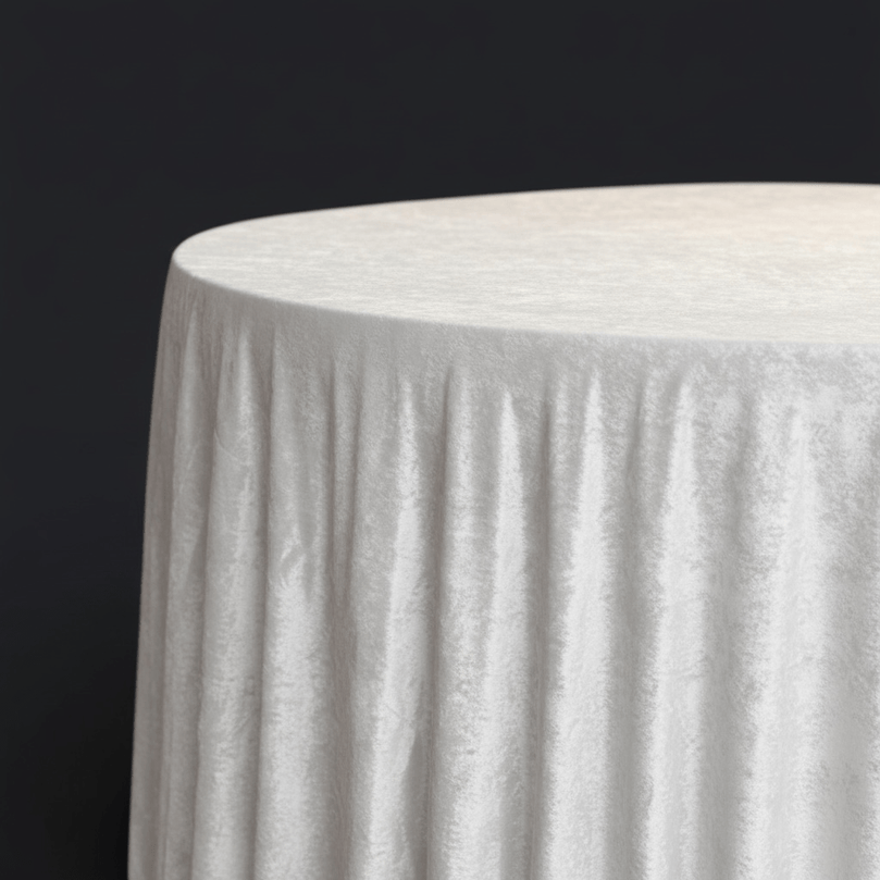 White round velvet tablecloth on a black background