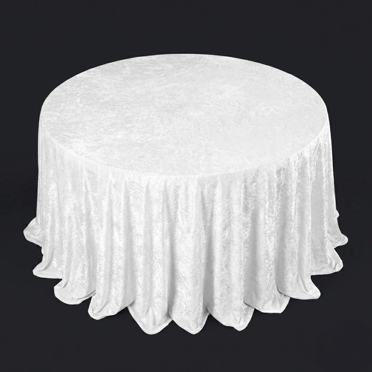 White round velvet tablecloth on a black background