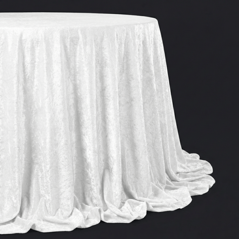 White round velvet tablecloth on a black background