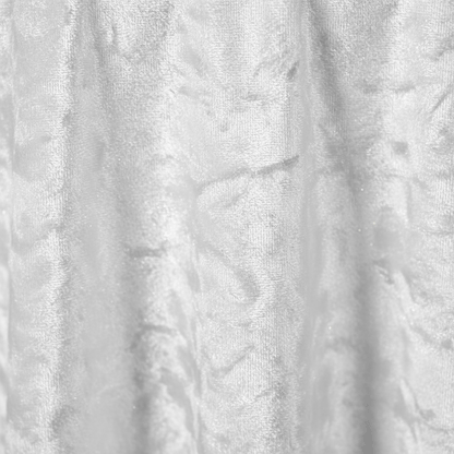 Close-up of textured white velvet fabric
