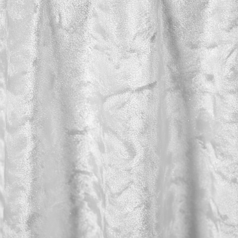 Close-up of textured white velvet fabric